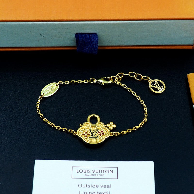 18K Louis Vuitton Vintage Lock Gold Bracelet