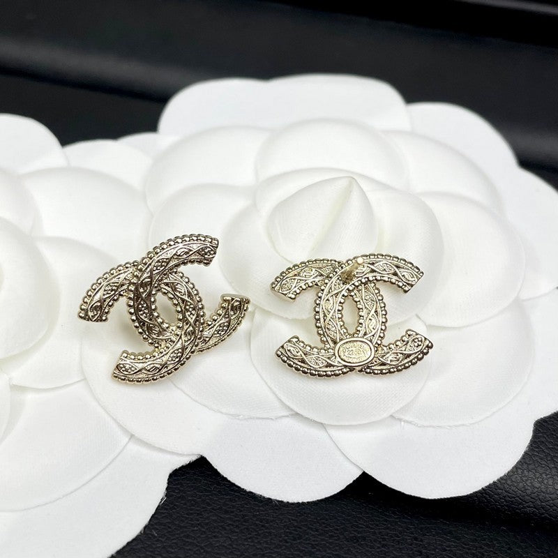 18K Chanel Relief Gold Earrings