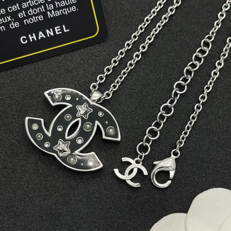 18K Chanel Black Star Gold Necklace
