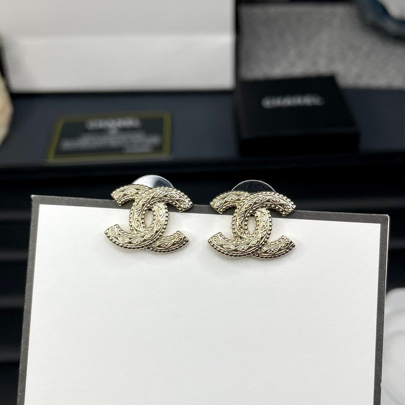 18K Chanel Relief Gold Earrings