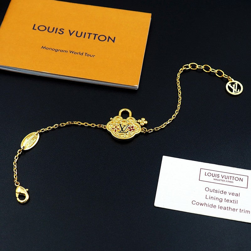 18K Louis Vuitton Vintage Lock Gold Bracelet