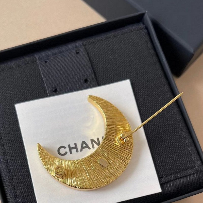 18K Chanel 25K Black Moon Brooch