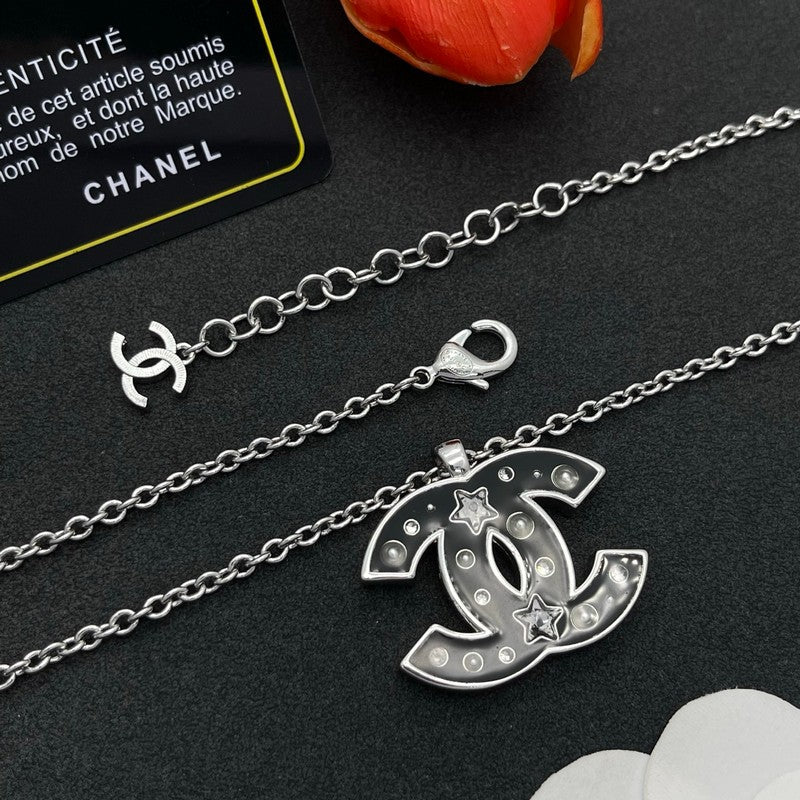 18K Chanel Black Star Gold Necklace
