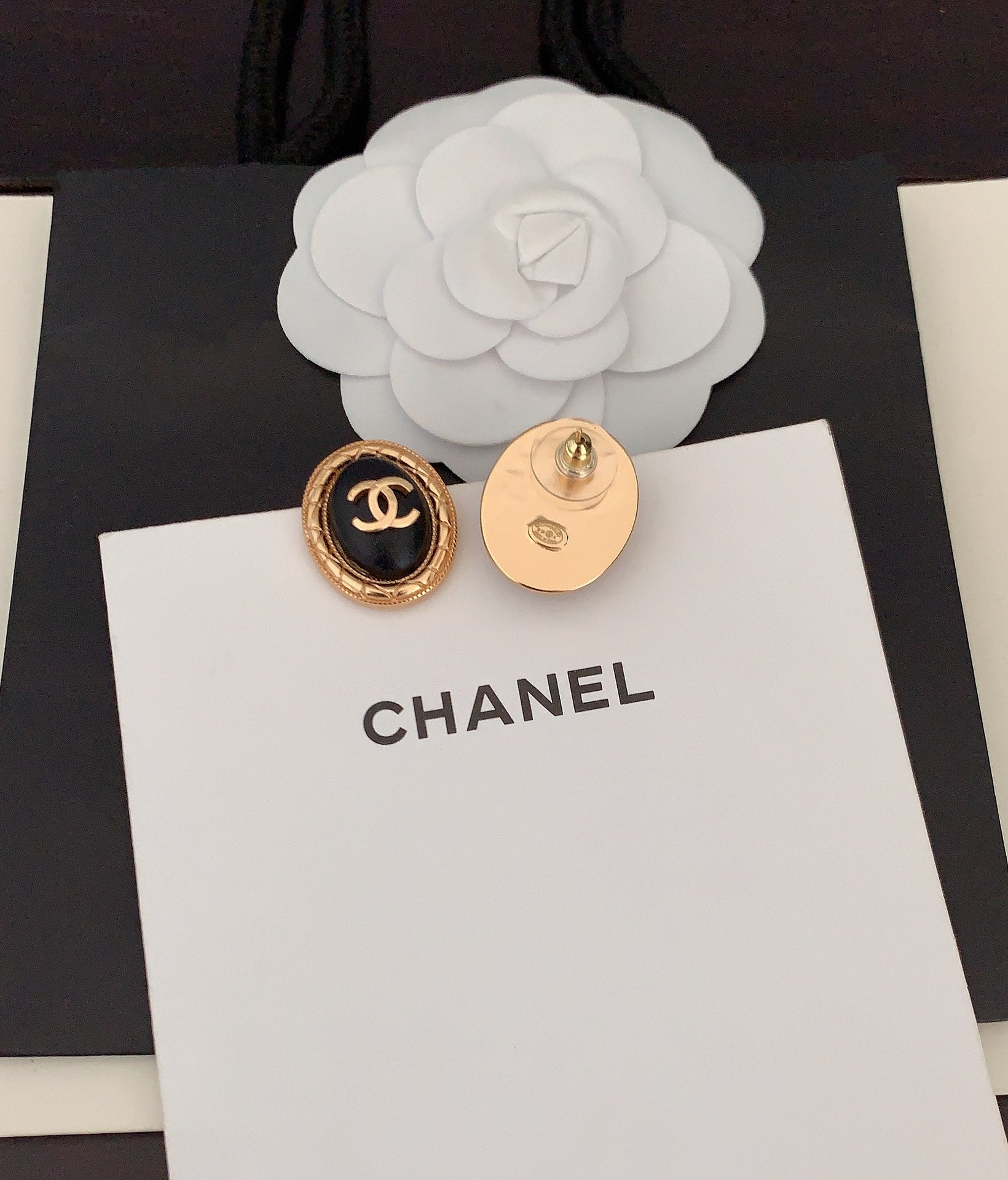 18K Chanel Oval Leather Earrings