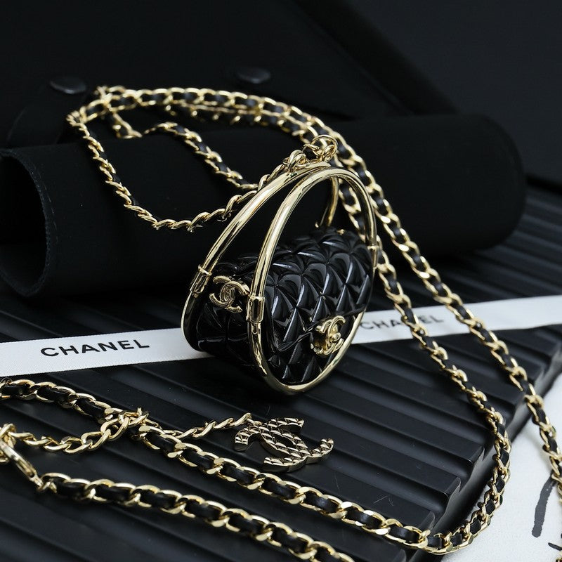18K Chanel Black Bag Long Leather Necklace