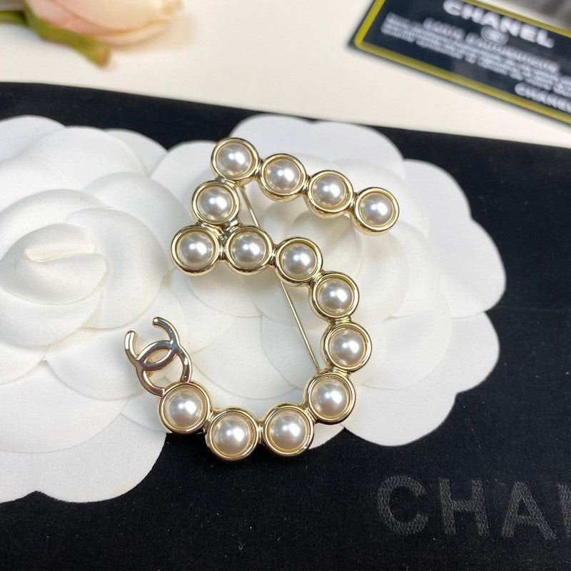 18K Chanel No.5 Pearl Gold Brooch