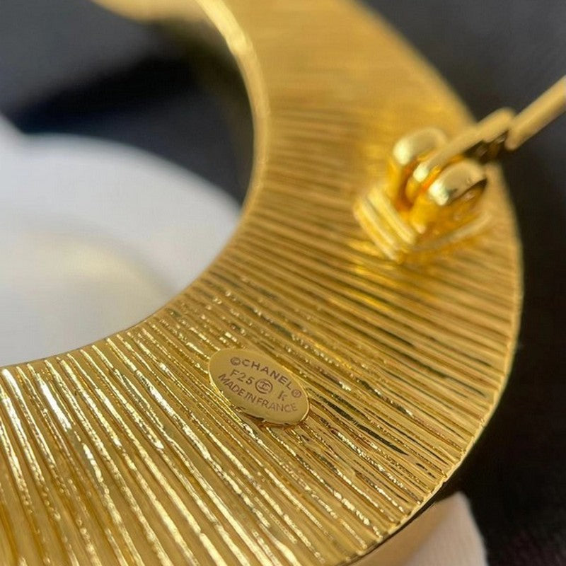 18K Chanel 25K Black Moon Brooch