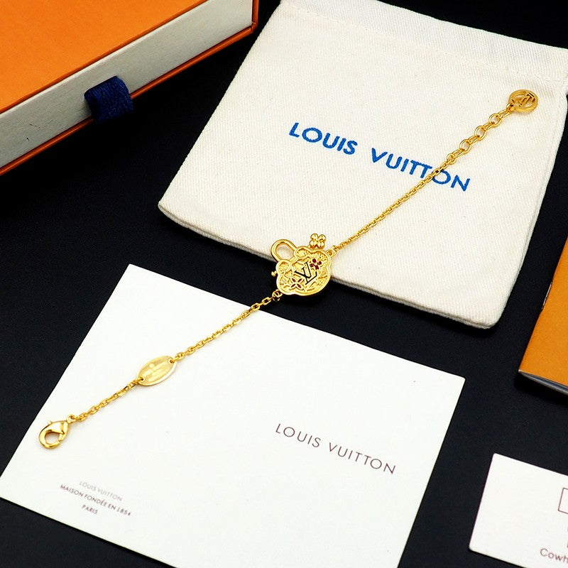 18K Louis Vuitton Vintage Lock Gold Bracelet