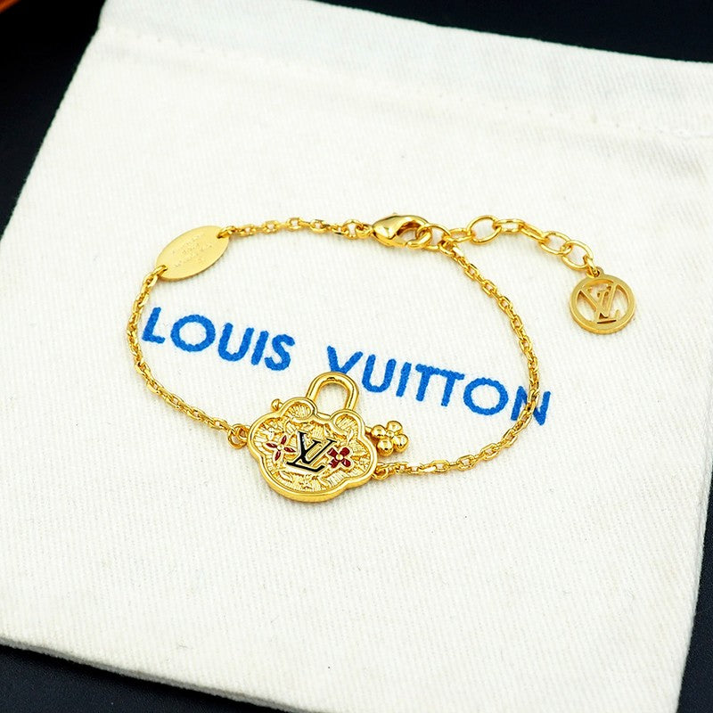 18K Louis Vuitton Vintage Lock Gold Bracelet