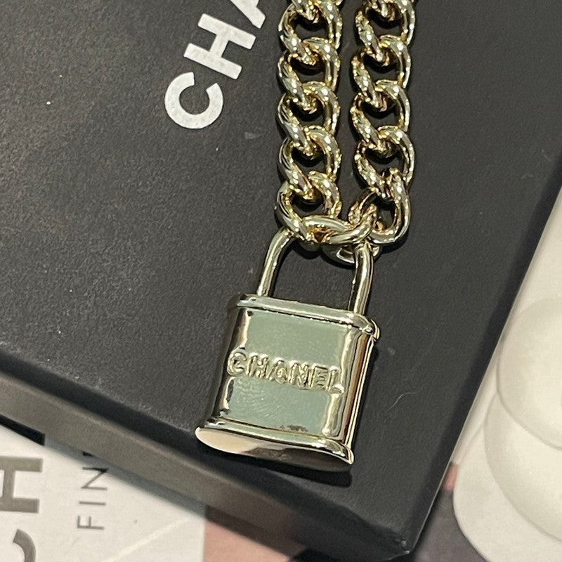 18K Chanel Black Leather Gold Lock Necklace