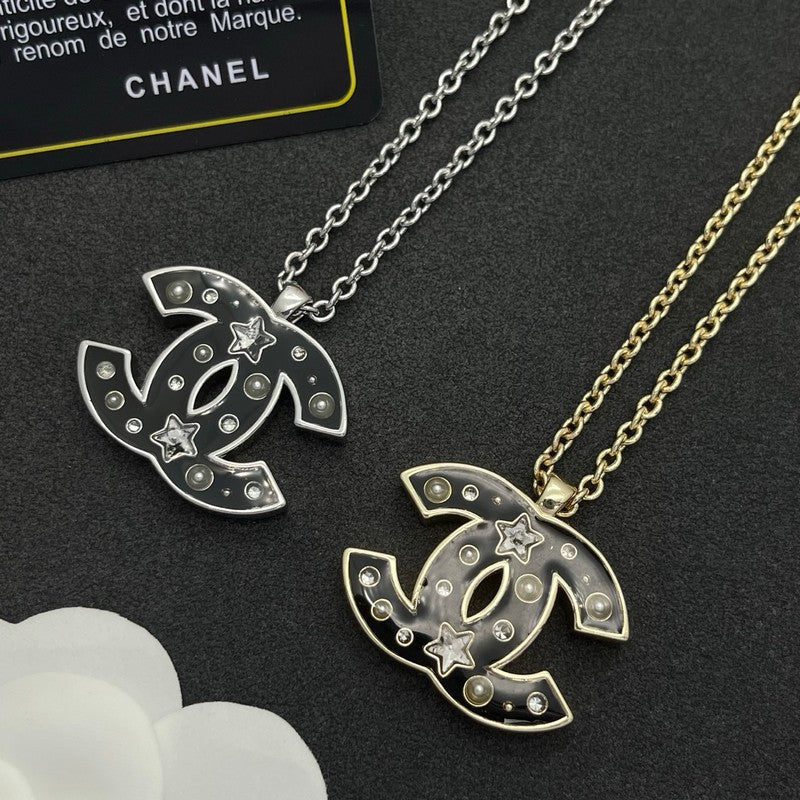 18K Chanel Black Star Gold Necklace