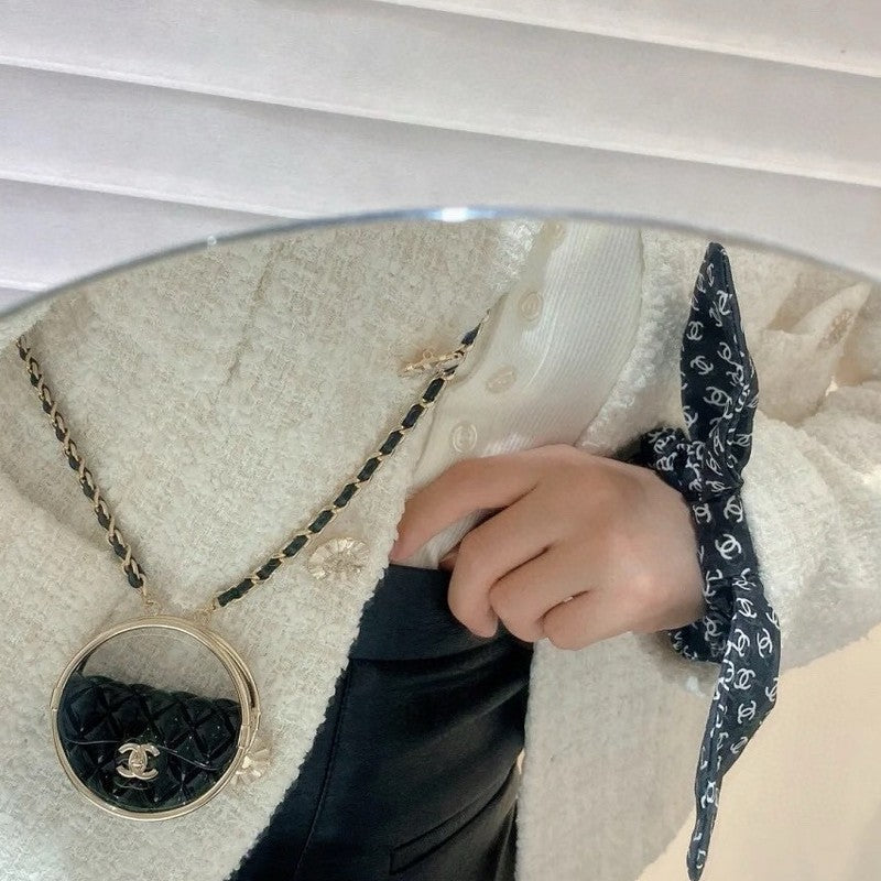18K Chanel Black Bag Long Leather Necklace