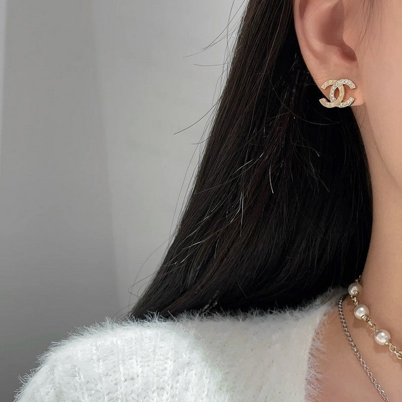 18K Chanel 25P Gold Earrings