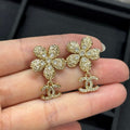 18K Chanel Twist Gold Diamond Earrings