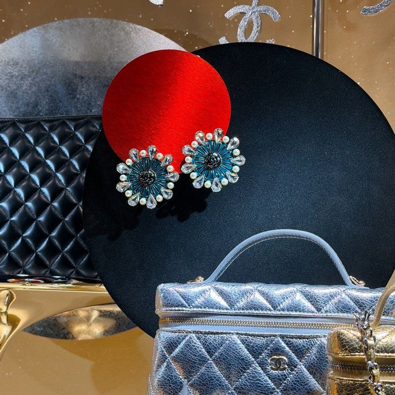 18K Chanel 26C Crystal Green Earrings
