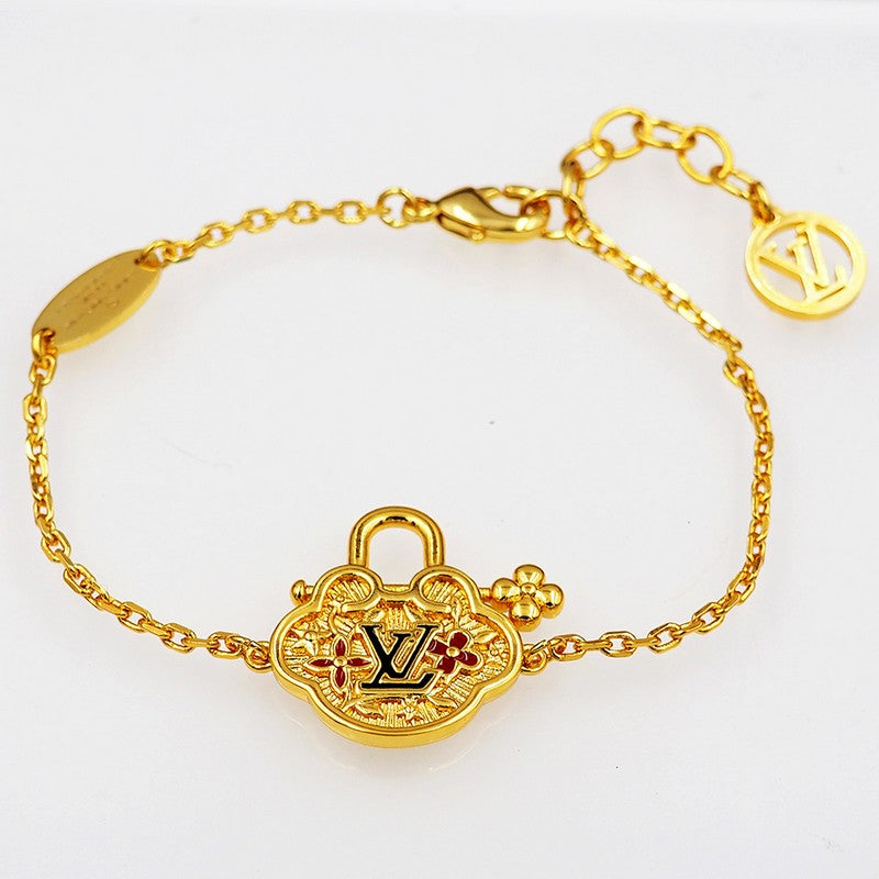 18K Louis Vuitton Vintage Lock Gold Bracelet