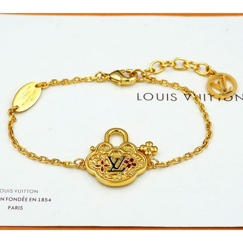 18K Louis Vuitton Vintage Lock Gold Bracelet